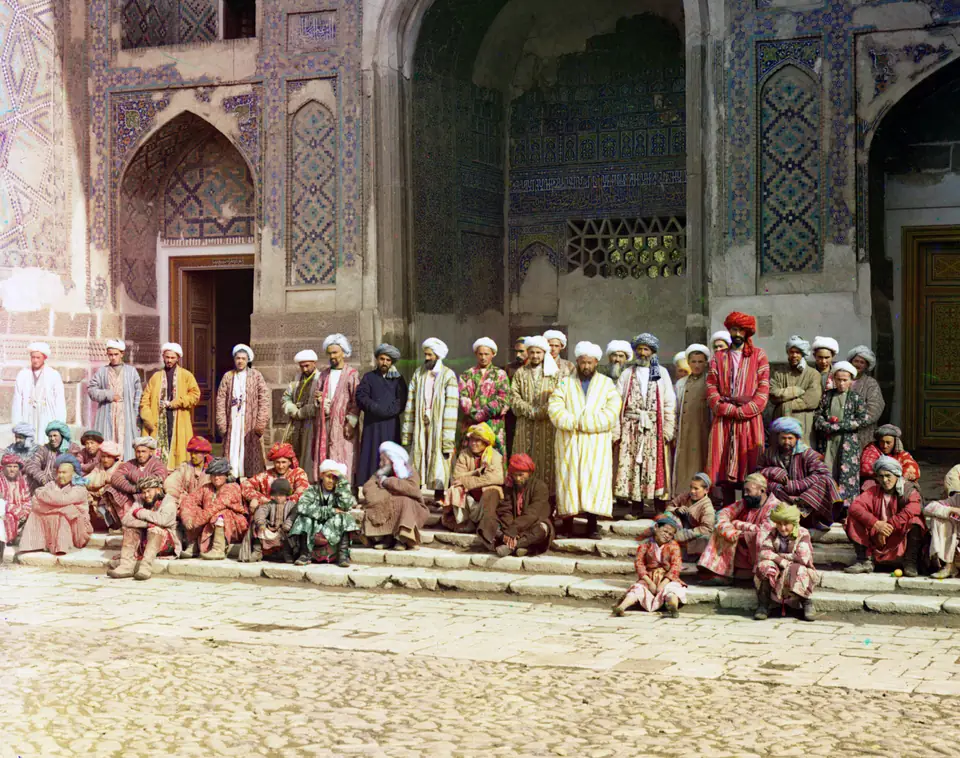 A crowd of traders and buyers gathered on the Registan square in Samarkand